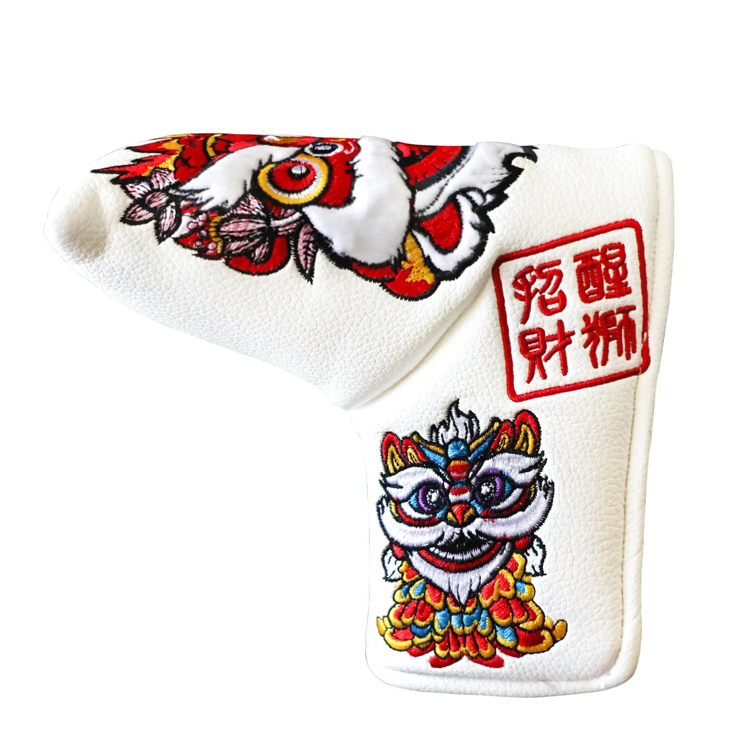 Close-up of driver head cover from Yamato white lion set, showing embroidery and craftsmanship