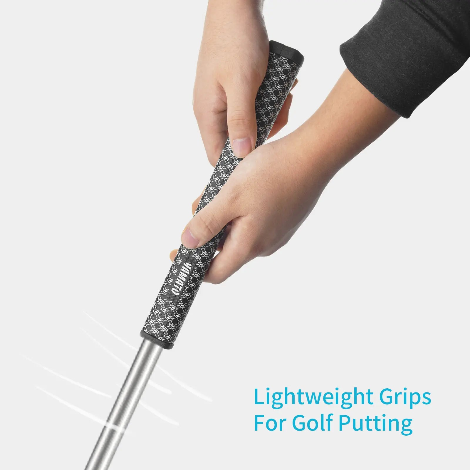 Golfer holding white Yamato putter grip during swing