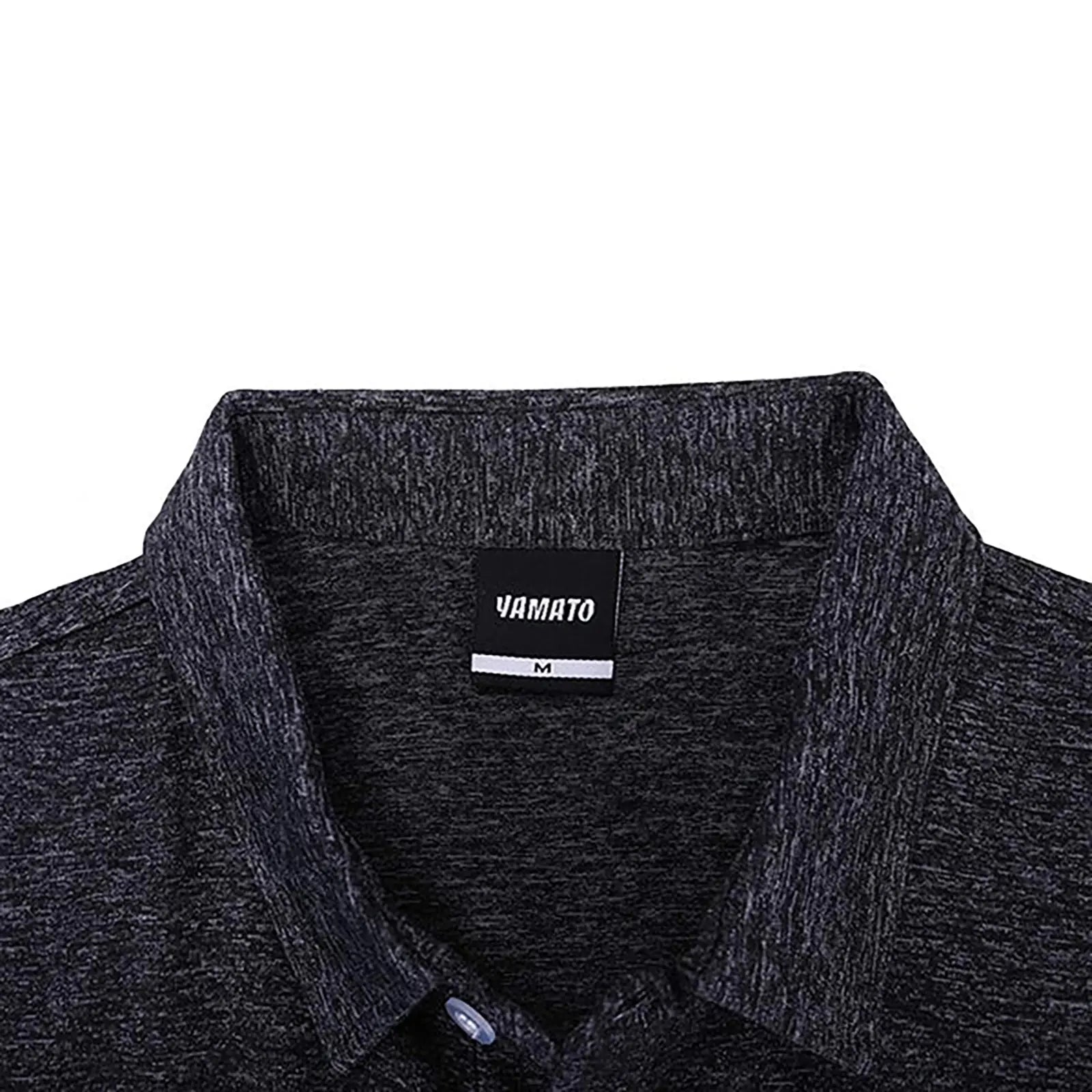 Close-up of the brand label on the inside of the Yamato Men's Slim Fit Golf Polo in black.