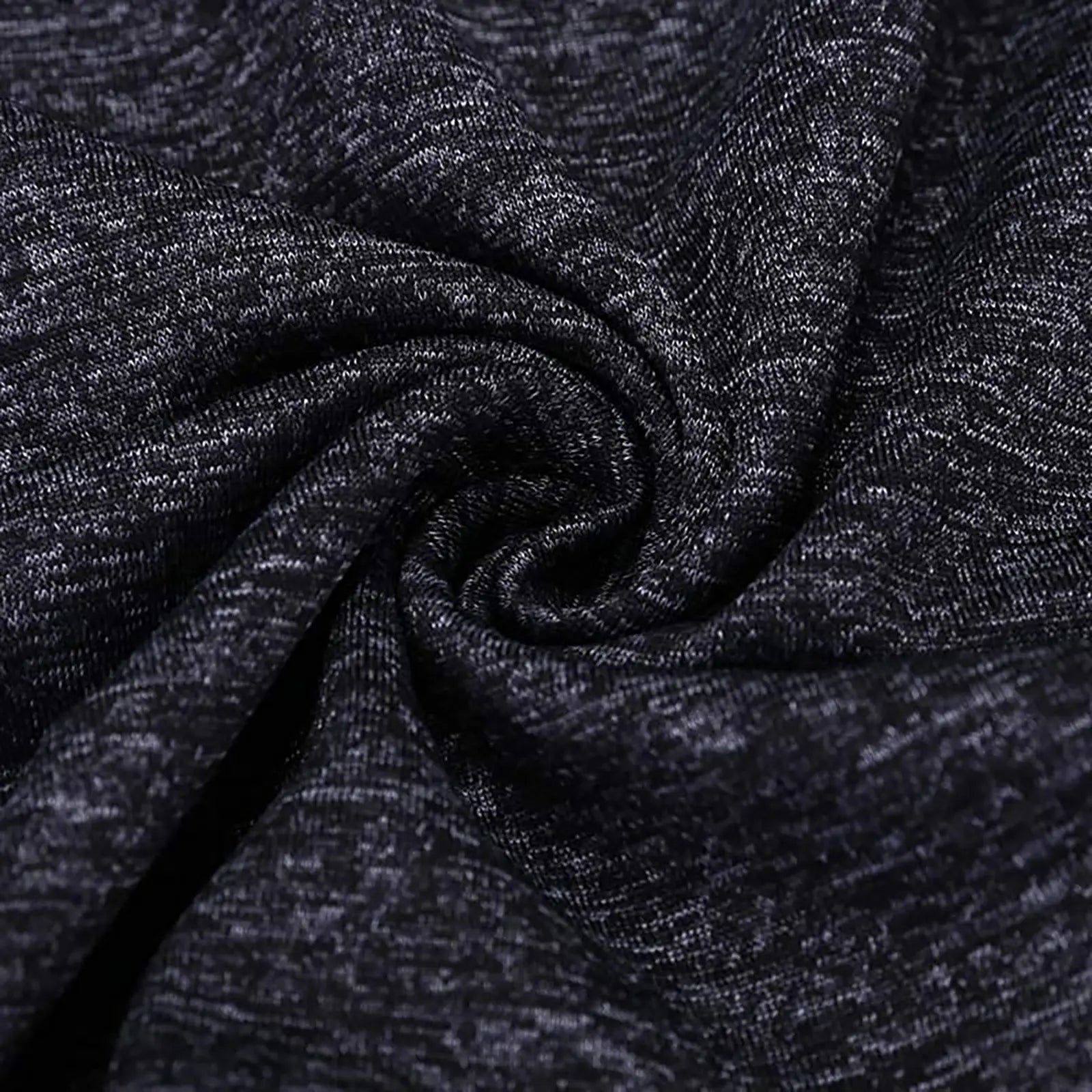 Close-up of the fabric texture of the Yamato Men's Slim Fit Golf Polo in black, demonstrating its lightweight and moisture-wicking properties.